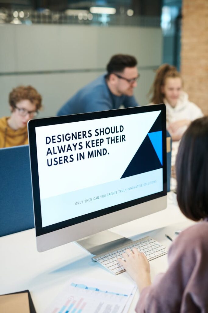 pexels-photo-3184455 Group of designers collaborating in modern office space with computer.